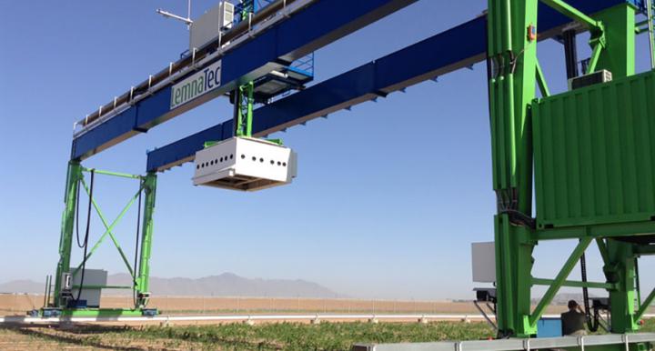 The world's largest robotic field scanner (white steel box)